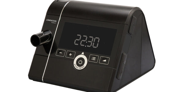 Black electronic device with digital display on a white background